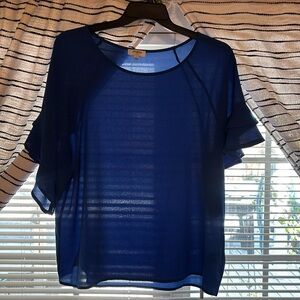Royal blue blouse with ruffle sleeves.